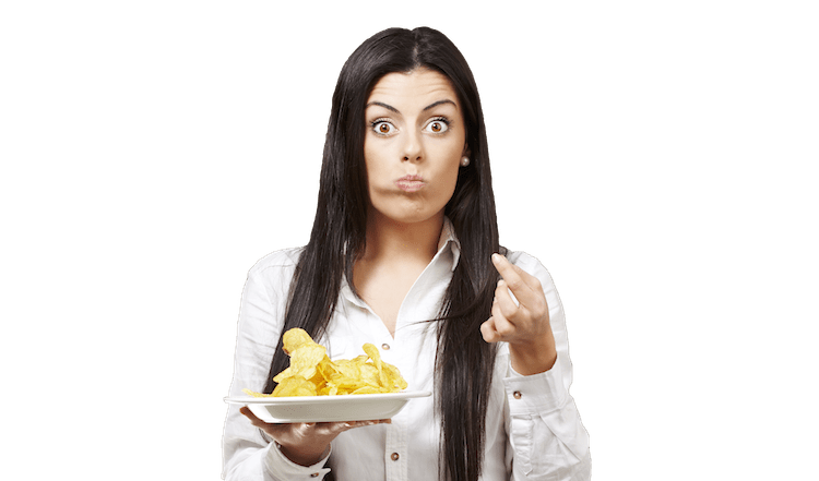 Girl eating greasy potato chips
